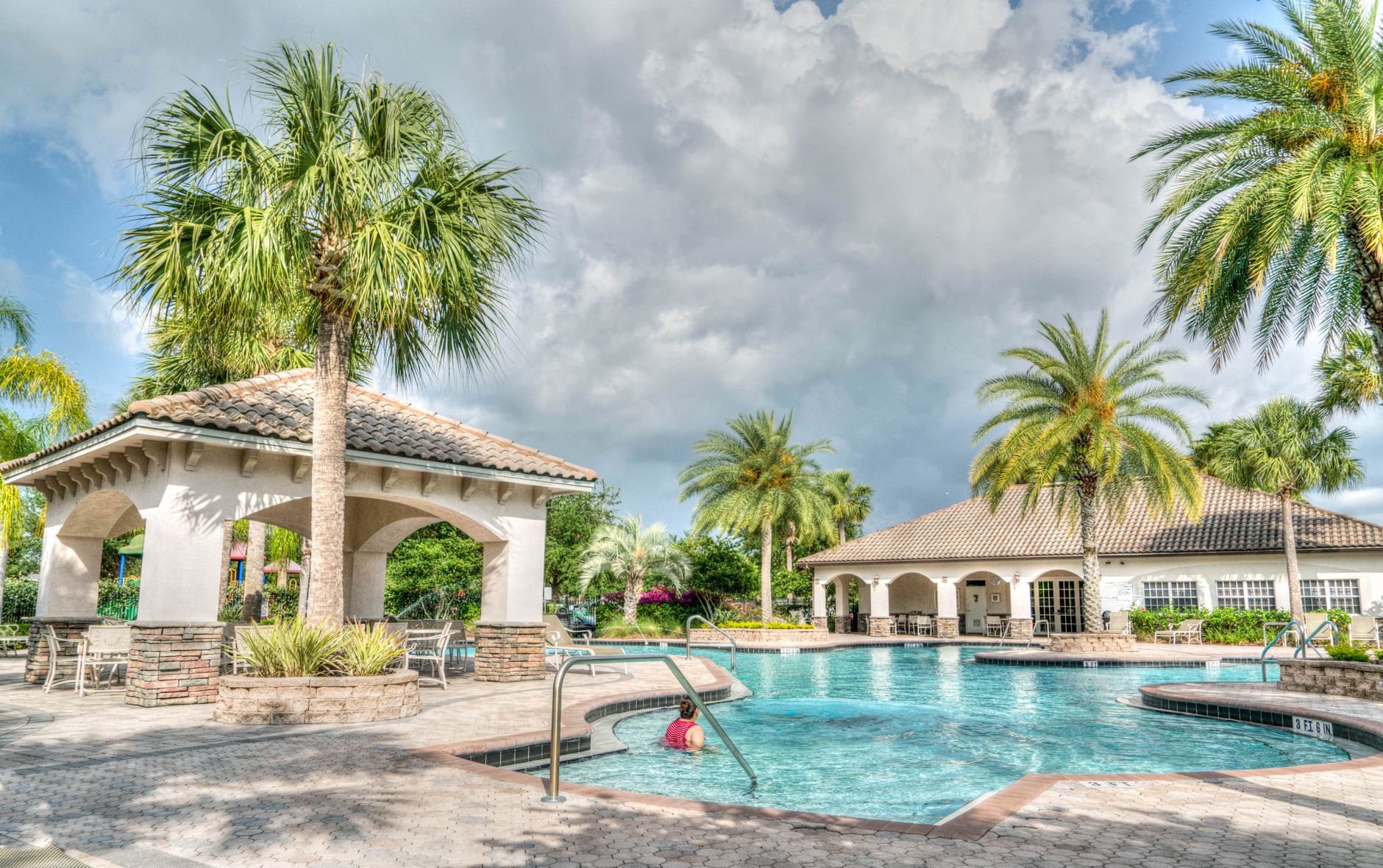 A crystal-clear pool serviced by Grandas Pool Solutions